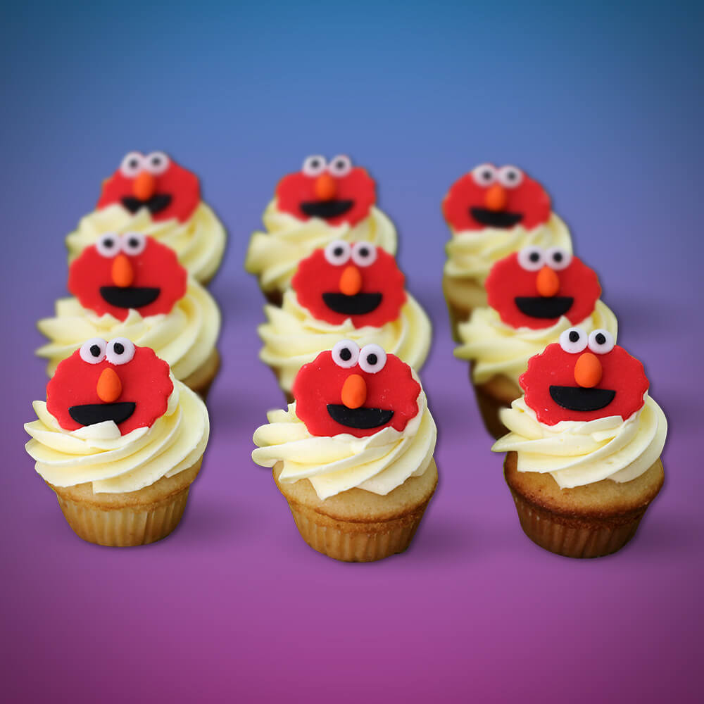Nuestra creaciones son un arte; Arte de la felicidad. Estos cupcakes decorados fueron inspiradas por Elmo.